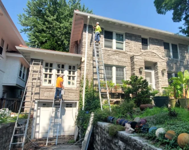 contractors working on an exterior painting